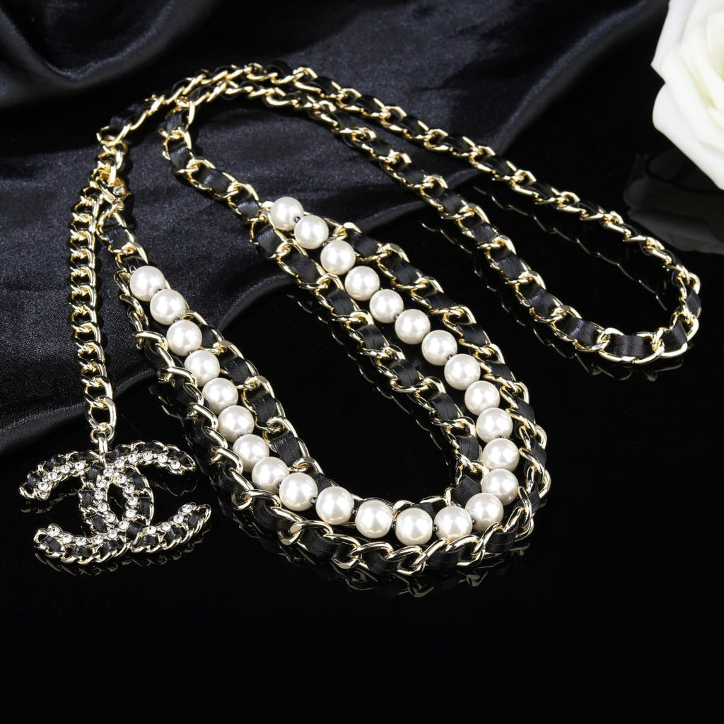 CHANEL 25S CHAIN BELT IN WHITE PEARL AND BLACK CALFSKIN 612711